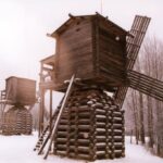 Wooden windmills, standing like the watchtowers of some forgotten civilisation, Arkhangelsk.