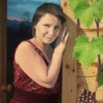 Lyuba, Vissarion's first wife. She knew him when he was a mere traffic cop.