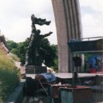 Celebrating giant proletarians - back view.